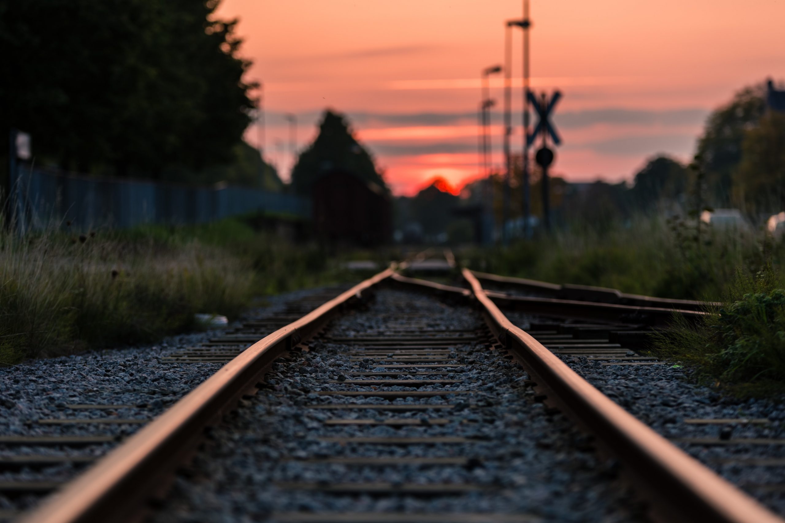 shallow focus photography of railway during sunset 892541 scaled